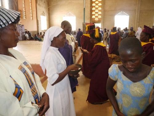Administering Holy Communion - Rev. sister