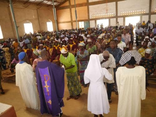 Administering Holy Communion - Rev. sister